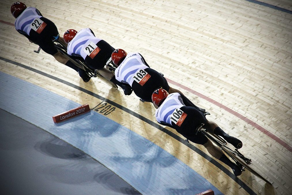 olympic cyclists at the velodrome racing for a gold medal
