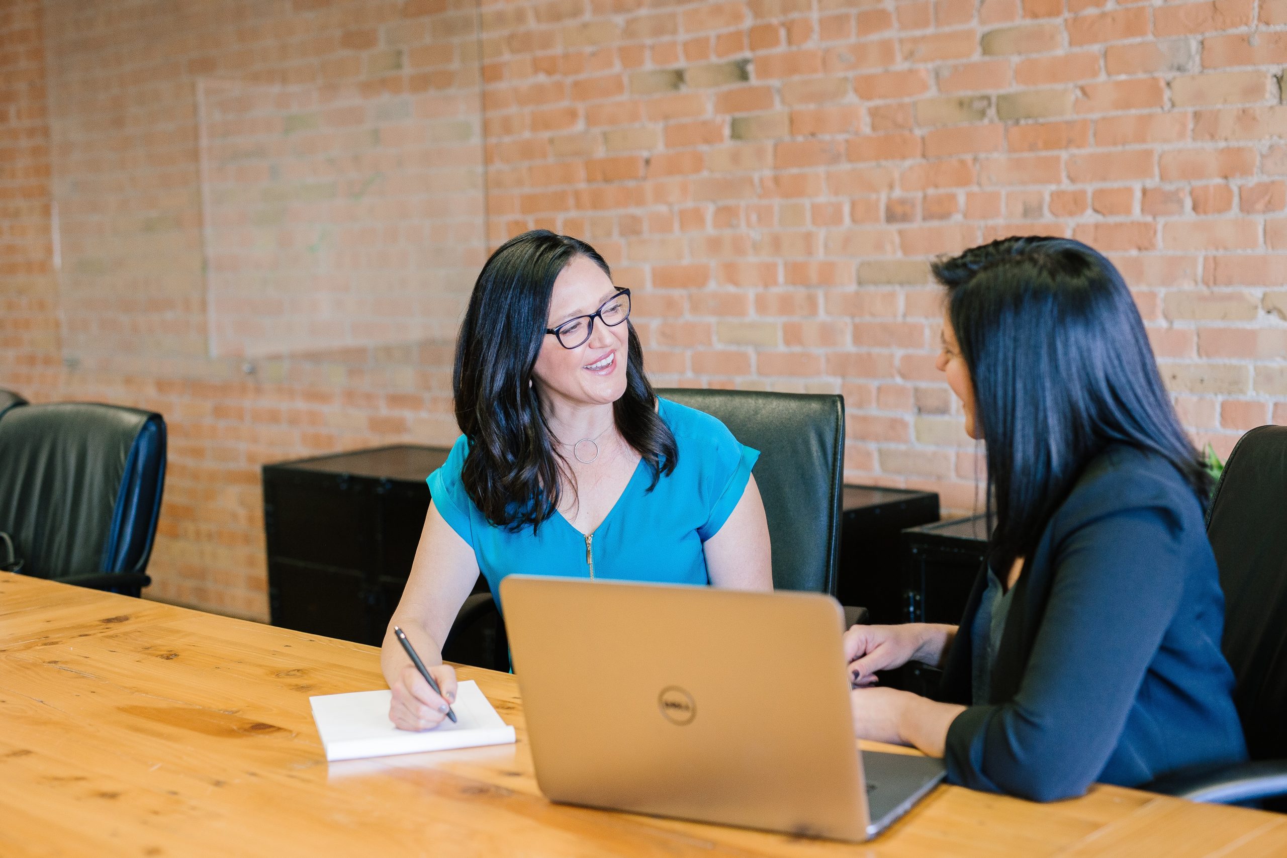 two women speaking 